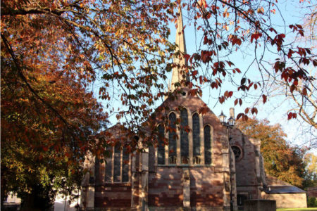 St Mary's Priory Church Monmouth with autumn trees